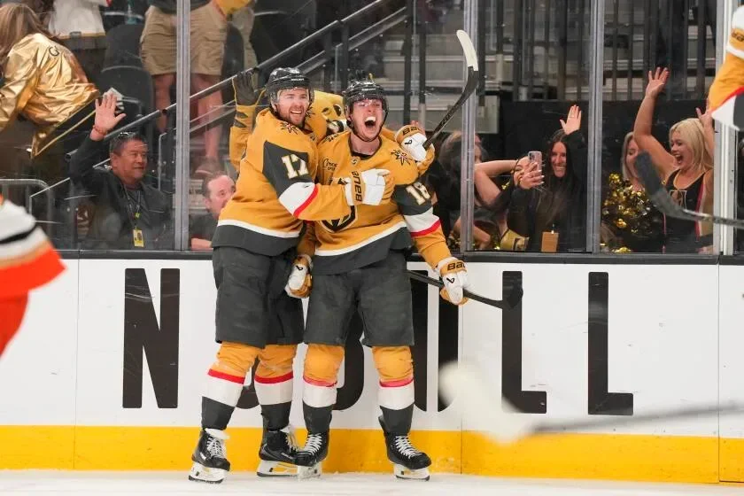 Vegas Golden Knights right wing Pavel Dorofeyev celebrates with teammates after scoring a game-winning goal.